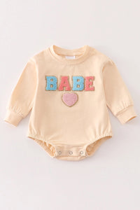 New

Beige French Knot Babe Baby Romper