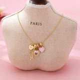 Multi Charm Porcelain Bow Ball Chain Necklace