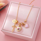 Multi Charm Porcelain Bow Ball Chain Necklace