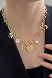 SUN BOW PEARL CROSS DISC U CHARM NECKLACE